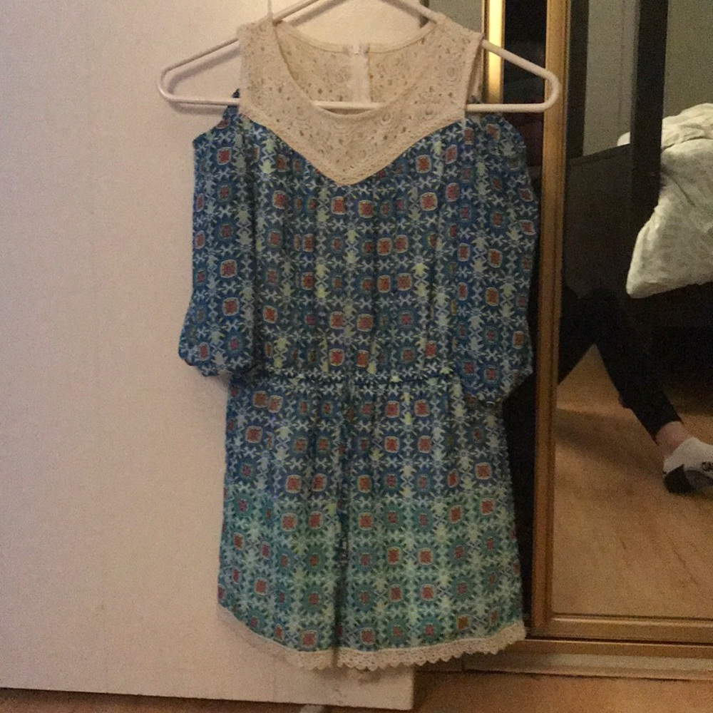 A blue pattern romper